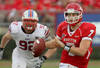 HOUSTON, TX - NOVEMBER 19: Quarterback Case Keenum #7 of the Houston Cougars rushes with the ball while defensive end Margus Hunt #92 of the Southern Methodist University Mustangs gives chase on November 19, 2011 at Robertson Stadium in Houston, Texas. (Photo by Thomas B. Shea/Getty Images)