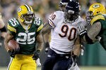 GREEN BAY, WI - DECEMBER 25:  Ryan Grant #25 of the Green Bay Packers carries the ball against the Chicago Bears at Lambeau Field on December 25, 2011 in Green Bay, Wisconsin.  (Photo by Matthew Stockman/Getty Images)