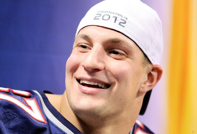 INDIANAPOLIS, IN - JANUARY 31:  Rob Gronkowski #87 of the New England Patriots answers questions from the media during Media Day ahead of Super Bowl XLVI against the New York Giants at Lucas Oil Stadium on January 31, 2012 in Indianapolis, Indiana.  (Photo by Andy Lyons/Getty Images)