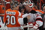 PHILADELPHIA, PA - MAY 08: Ilya Bryzgalov #30 of the Philadelphia Flyers and Martin Brodeur #30 of the New Jersey Devils shake hands following the Devils victory over the Philadelphia Flyers in Game Five of the Eastern Conference Semifinals during the 2012 NHL Stanley Cup Playoffs at Wells Fargo Center on May 8, 2012 in Philadelphia, Pennsylvania. The Devils defeated the Flyers 3-1 to win the series four games to one. (Photo by Bruce Bennett/Getty Images)