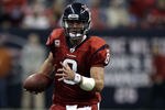 HOUSTON, TX - DECEMBER 13:  Quarterback Matt Schaub #8 of the Houston Texans runs out of the pocket as he looks for a receiver against the Baltimore Ravens at Reliant Stadium on December 13, 2010 in Houston, Texas.  (Photo by Bob Levey/Getty Images)