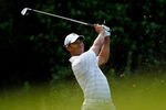 CHARLOTTE, NC - MAY 03:  Tiger Woods of the United States hits his tee shot on the 13th hole during the first round of the Wells Fargo Championship at the Quail Hollow Club on May 3, 2012 in Charlotte, North Carolina.  (Photo by Streeter Lecka/Getty Images)