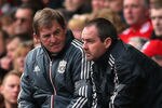 LIVERPOOL, ENGLAND - APRIL 07:  Kenny Dalglish the manager of Liverpool talks with Steve Clarke during the Barclays Premier League match between Liverpool and Aston Villa at Anfield on April 7, 2012 in Liverpool, England.  (Photo by Alex Livesey/Getty Images)