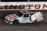 DARLINGTON, SC - MAY 07: Brian Vickers, driver of the #63 Red Bull Toyota, drives by with damage to his race car during the NASCAR Sprint Cup Series SHOWTIME Southern 500 at Darlington Raceway on May 7, 2011 in Darlington, South Carolina.  (Photo by Jerry Markland/Getty Images for NASCAR)