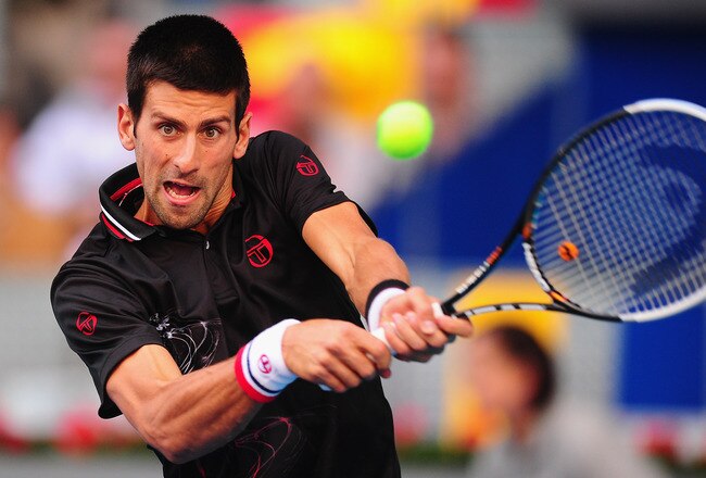 MADRID, SPAIN - MAY 08:  Novak Djokovic of Serbia in action against Daniel Gimeno-Traver of Spain in the 2nd round of the Mutua Madrilena Madrid Open at the Caja Magica on May 8, 2012 in Madrid, Spain.  (Photo by Mike Hewitt/Getty Images)