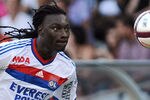 LYON, FRANCE - AUGUST 13:  Bafetimbi Gomis of Olympique Lyonnais in action during the Ligue 1 match between Olympique Lyonnais and AC Ajaccio at Gerland Stadium on August 13, 2011 in Lyon, France.  (Photo by Valerio Pennicino/Getty Images)