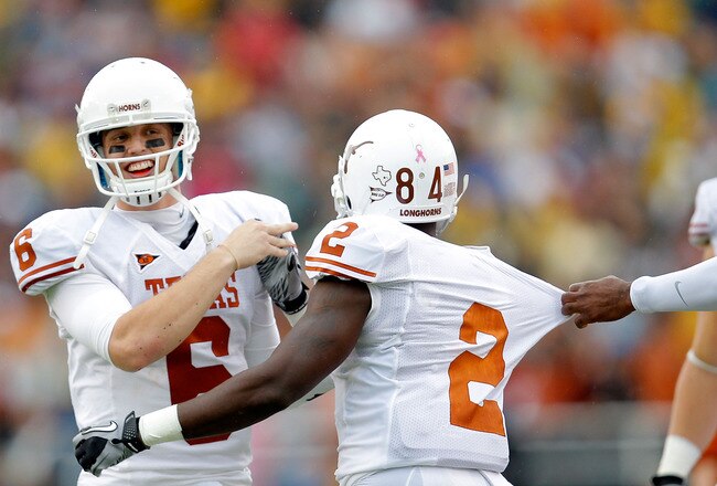 WACO, TX - DECEMBER 03:  Case McCoy #6 of the Texas Longhorns celebrates with Marquise Goodwin #2 during a game against the Baylor Bears at Floyd Casey Stadium on December 3, 2011 in Waco, Texas.  (Photo by Sarah Glenn/Getty Images)