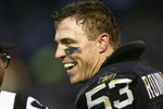OAKLAND, CA - JANUARY 12:  Bill Romanowski #53 of the Oakland Raiders celebrates after contributing to the win by recovering a fumble against the New York Jets during the AFC Division Playoff game at Network Associates Coliseum on January 12, 2003 in Oakland, California.  The Raiders won 30-10, sending them on to the AFC Championship game.  (Photo by Stephen Dunn/Getty Images)