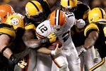 PITTSBURGH, PA - DECEMBER 08:  Colt McCoy #12 of the Cleveland Browns is stopped by the Pittsburgh Steelers defense at Heinz Field on December 8, 2011 in Pittsburgh, Pennsylvania.  (Photo by Jared Wickerham/Getty Images)
