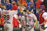 PHILADELPHIA - MAY 9: First baseman Ike Davis #29 of the New York Mets is congratulated by right fielder Scott Hairston #12 after hitting a home run during a game against the Philadelphia Phillies at Citizens Bank Park on May 9, 2012 in Philadelphia, Pennsylvania. (Photo by Hunter Martin/Getty Images)