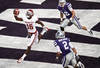 MANHATTAN, KS - OCTOBER 29:  Jaz Reynolds #16 of the Oklahoma Sooners snags an 8-yard touchdown pass past Tysyn Hartman #2 and Ty Zimmerman #12 of the Kansas State Wildcats in the third quarter at Bill Snyder Family Stadium on October 29, 2011 in Manhattan, Kansas. Oklahoma won 58-17. (Photo by Ed Zurga/Getty Images)