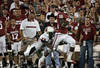 NORMAN, OK - OCTOBER 1:  Wide receiver Jaz Reynolds #16 of the Oklahoma Sooners is wrapped up by corner back Andre Dawson #28 of the Ball State Cardinals in the second half October 1, 2011 at Gaylord Family-Oklahoma Memorial Stadium in Norman, Oklahoma.  Oklahoma defeated Ball State 62-6.  (Photo by Brett Deering/Getty Images)