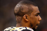 NEW ORLEANS, LA - DECEMBER 12:  Tracy Porter has the cast of 'Family Guy' shaved into his head for the game against the St. Louis Rams of the New Orleans Saints at the Louisiana Superdome on December 12, 2010 in New Orleans, Louisiana.  (Photo by Chris Graythen/Getty Images)