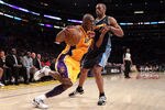 LOS ANGELES, CA - MAY 08:  Kobe Bryant #24 of the Los Angeles Lakers drives on Arron Afflalo #6 of the Denver Nuggets in the second quarter in Game Five of the Western Conference Quarterfinals in the 2012 NBA Playoffs on May 8, 2012 at Staples Center in Los Angeles, California. NOTE TO USER: User expressly acknowledges and agrees that, by downloading and or using this photograph, User is consenting to the terms and conditions of the Getty Images License Agreement.  (Photo by Jeff Gross/Getty Images)