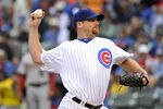 CHICAGO, IL - SEPTEMBER 18:  Ryan Dempster #46 of the Chicago Cubs delivers during the second inning against the Houston Astros at Wrigley Field on September 18, 2011 in Chicago, Illinois.  (Photo by Brian Kersey/Getty Images)
