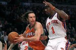 NEW YORK, NY - JANUARY 17:  Steve Nash #13 of the Phoenix Suns drives to the basket against Amar'e Stoudemire #1 of the New York Knicks at Madison Square Garden on January 17, 2011 in New York City. NOTE TO USER: User expressly acknowledges and agrees that, by downloading and or using this photograph, User is consenting to the terms and conditions of the Getty Images License Agreement.  (Photo by Nick Laham/Getty Images)