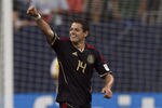 HOUSTON - JUNE 22:  Javier Hernandez #14 of Mexico celebrates his goal in the first overtime period against Honduras at Reliant Stadium on June 22, 2011 in Houston, Texas. Mexico won 2-0.  (Photo by Bob Levey/Getty Images)