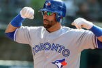 CLEVELAND, OH - APRIL 5: Jose Bautista #19 of the Toronto Blue Jays celebrates after hitting a solo home run during the fourth inning against the Cleveland Indians at the opening day game at Progressive Field on April 5, 2012 in Cleveland, Ohio. (Photo by Jason Miller/Getty Images)