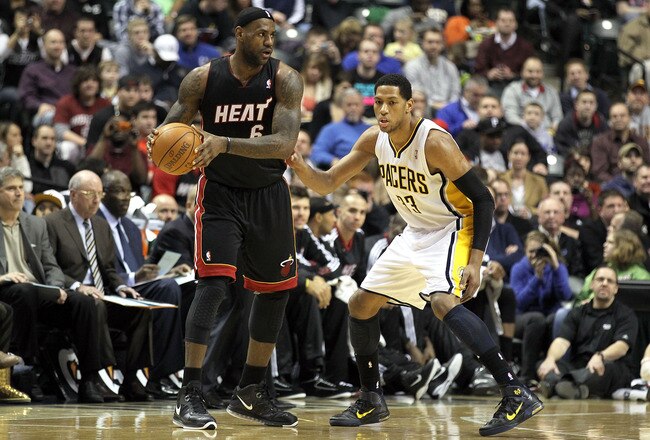 INDIANAPOLIS - FEBRUARY 15: LeBron James #6 of the Miami Heat is guarded by Danny Granger #33 of the Indiana Pacers during the NBA game at Conseco Fieldhouse on February 15, 2011 in Indianapolis, Indiana.   The Heat won 110-103.   NOTE TO USER: User expressly acknowledges and agrees that, by downloading and/or using this Photograph, User is consenting to the terms and conditions of the Getty Images License Agreement.  (Photo by Andy Lyons/Getty Images)