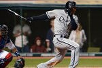 CLEVELAND, OH - MAY 9: Alejandro De Aza #30 of the Chicago White Sox hits a two RBI double during the fourth inning against the Cleveland Indians at Progressive Field on May 9, 2012 in Cleveland, Ohio. (Photo by Jason Miller/Getty Images)
