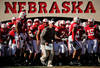 LINCOLN, NE - OCTOBER 30: Coach Bo Pelini  leads his Nebraska Cornhusker football team on the field against the Missouri Tigers at Memorial Stadium on October 30, 2010 in Lincoln, Nebraska. Nebraska Defeated Missouri 31-17. (Photo by Eric Francis/Getty Images)
