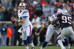 FOXBORO, MA - JANUARY 1:  Ryan Fitzpatrick #14 of the Buffalo Bills  prepares to throw against the New England Patriots at Gillette Stadium on January 1, 2012 in Foxboro, Massachusetts. (Photo by Jim Rogash/Getty Images)