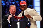 NEW YORK, NY - APRIL 28:  NFL Commissioner Roger Goodell poses for a photo with Marcell Dareus, #3 overall pick by the Buffalo Bills, as Dareus holds up a jersey during the 2011 NFL Draft at Radio City Music Hall on April 28, 2011 in New York City.  (Photo by Chris Trotman/Getty Images)
