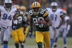 GREEN BAY, WI - JANUARY 01:  Donald Driver #80 of the Green Bay Packers runs for a touchdown against the Detroit Lions at Lambeau Field on January 1, 2012 in Green Bay, Wisconsin. The Packers defeated the Lions 45-41.  (Photo by Jonathan Daniel/Getty Images)
