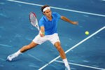 MADRID, SPAIN - MAY 09:  Roger Federer of Switzerland in action during his 3rd round match with Milos Raonic of Canada in the Mutua Madrilena Madrid Open at the Caja Magica on May 9, 2012 in Madrid, Spain.  (Photo by Mike Hewitt/Getty Images)