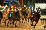 LOUISVILLE, KY - MAY 05:  Bodemeister ridden by Mike Smith comes around the final turn during the 138th running of the Kentucky Derby at Churchill Downs on May 5, 2012 in Louisville, Kentucky.  (Photo by Andy Lyons/Getty Images)