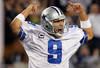 ARLINGTON, TX - DECEMBER 11:  Tony Romo #9 of the Dallas Cowboys celebrates after the Cowboys scored against the New York Giants in the fourth quarter at Cowboys Stadium on December 11, 2011 in Arlington, Texas.  (Photo by Tom Pennington/Getty Images)