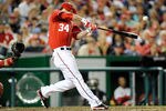 WASHINGTON, DC - MAY 06:  Bryce Harper #34 of the Washington Nationals hits a double in the eighth inning against the Philadelphia Phillies at Nationals Park on May 6, 2012 in Washington, DC.  (Photo by Greg Fiume/Getty Images)