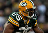 GREEN BAY, WI - JANUARY 15:   Ryan Grant #25 of the Green Bay Packers runs witht the ball against the New York Giants during their NFC Divisional playoff game at Lambeau Field on January 15, 2012 in Green Bay, Wisconsin.  (Photo by Jonathan Daniel/Getty Images)