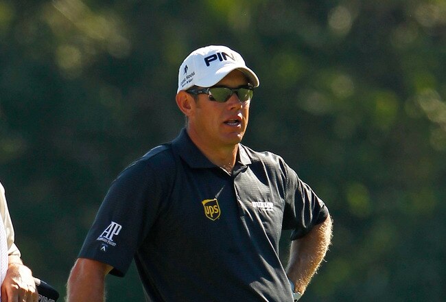 PONTE VEDRA BEACH, FL - MAY 11: Lee Westwood of England (R) and caddie Cayce Kerr(L) stand on the 14th hole during the second round of THE PLAYERS Championship held at THE PLAYERS Stadium course at TPC Sawgrass on May 11, 2012 in Ponte Vedra Beach, Florida.  (Photo by Mike Ehrmann/Getty Images)