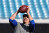 JACKSONVILLE, FL - JANUARY 01: Tight end Dallas Clark #44 of the Indianapolis Colts grabs a warmup pass against the Jacksonville Jaguars January 1, 2012 at EverBank Field in Jacksonville, Florida.  (Photo by Al Messerschmidt/Getty Images)