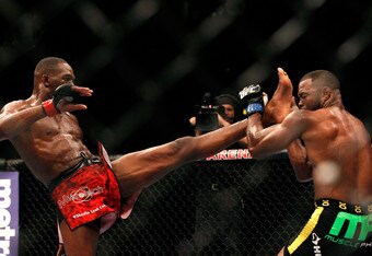 ATLANTA, GA - APRIL 21:  Jon Jones (L) kicks Rashad Evans during their light heavyweight title bout for UFC 145 at Philips Arena on April 21, 2012 in Atlanta, Georgia.  (Photo by Kevin C. Cox/Getty Images)