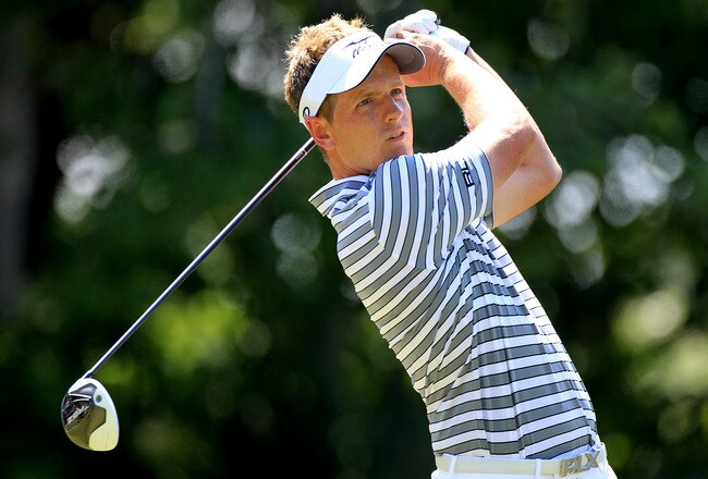PONTE VEDRA BEACH, FL - MAY 10:  Luke Donald of England hits his tee shot on the seventh hole during the first round of THE PLAYERS Championship held at THE PLAYERS Stadium course at TPC Sawgrass on May 10, 2012 in Ponte Vedra Beach, Florida.  (Photo by Sam Greenwood/Getty Images)