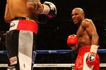 LAS VEGAS, NV - MAY 05:  Floyd Mayweather Jr. looks over at Miguel Cotto during their WBA super welterweight title fight at the MGM Grand Garden Arena on May 5, 2012 in Las Vegas, Nevada.  (Photo by Al Bello/Getty Images)