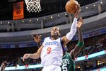 PHILADELPHIA - NOVEMBER 03:  Andre Iguodala #9 of the Philadelphia 76ers dunks against the Boston Celtics at the Wachovia Center on November 3, 2009 in Philadelphia, Pennsylvania.  NOTE TO USER: User expressly acknowledges and agrees that, by downloading and or using this photograph, User is consenting to the terms and conditions of the Getty Images License Agreement.  (Photo by Chris Chambers/Getty Images)