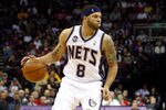 NEWARK, NJ - APRIL 14:  Deron Williams #8 of the New Jersey Nets looks to pass the ball against the Boston Celtics at Prudential Center on April 14, 2012 in Newark, New Jersey. NOTE TO USER: User expressly acknowledges and agrees that, by downloading and or using this photograph, User is consenting to the terms and conditions of the Getty Images License Agreement.  (Photo by Chris Chambers/Getty Images)