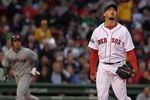 BOSTON, MA - MAY 10:  Josh Beckett #19 of the Boston Red Sox watches as  a ball hit by Jack Hannahan #9 of the Cleveland Indians leaves the field for a two-run home run in the second inning at Fenway Park May 10, 2012  in Boston, Massachusetts. (Photo by Jim Rogash/Getty Images)