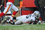 KANSAS CITY, MO - DECEMBER 24:  Wide receiver Darrius Heyward-Bey #85 of the Oakland Raiders catches a 54-yard pass against the Kansas City Chiefs during overtime, helping set up the game winning field goal on December 24, 2011 at Arrowhead Stadium in Kansas City, Missouri.  Oakland defeated Kansas City 16-13 in overtime.  (Photo by Peter Aiken/Getty Images)