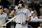 NEW YORK, NY - MAY 11:  Jesus Montero #63 of the Seattle Mariners celebrates after hitting a solo homerun in the sixth-inning against the New York Yankees at homeplate at Yankee Stadium on May 11, 2012 in the Bronx borough of New York City.  (Photo by Mike Stobe/Getty Images)