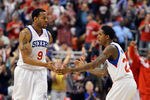 PHILADELPHIA, PA - MAY 10: Andre Iguodala #9 and Lou Williams #23 of the Philadelphia 76ers celebrate a play during the game against the Chicago Bulls in Game Six of the Eastern Conference Quarterfinals in the 2012 NBA Playoffs at the Wells Fargo Center on May 10, 2012 in Philadelphia, Pennsylvania. The 76ers won 79-78. 
NOTE TO USER: User expressly acknowledges and agrees that, by downloading and or using this photograph, User is consenting to the terms and conditions of the Getty Images License Agreement. (Photo by Drew Hallowell/Getty Images)