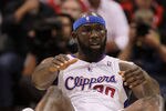 LOS ANGELES, CA - MAY 11:  Reggie Evans #30 of the Los Angeles Clippers reacts as he lies on his back in the second quarter while taking on the Memphis Grizzlies in Game Six of the Western Conference Quarterfinals in the 2012 NBA Playoffs on May 11, 2012 at Staples Center in Los Angeles, California.  NOTE TO USER: User expressly acknowledges and agrees that, by downloading and or using this photograph, User is consenting to the terms and conditions of the Getty Images License Agreement.  (Photo by Stephen Dunn/Getty Images)