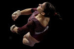 ST PAUL, MN - AUGUST 20:  Alexandra Raisman competes on the vault during the Senior Women's competition on day four of the Visa Gymnastics Championships at Xcel Energy Center on August 20, 2011 in St Paul, Minnesota.  (Photo by Ronald Martinez/Getty Images)