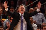 NEW YORK, NY - FEBRUARY 10: Head coach Mike D'Antoni of the New York Knicks reachs as he coaches against the Los Angeles Lakers at Madison Square Garden on February 10, 2012 in New York City.  NOTE TO USER: User expressly acknowledges and agrees that, by downloading and or using this photograph, User is consenting to the terms and conditions of the Getty Images License Agreement.  (Photo by Chris Chambers/Getty Images)