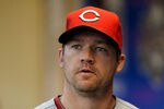 MILWAUKEE, WI - MAY 07: Scott Rolen #27 of the Cincinnati Reds gets ready in the dugout before the game against the Milwaukee Brewers at Miller Park on May 07, 2012 in Milwaukee, Wisconsin. (Photo by Mike McGinnis/Getty Images)