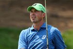 PONTE VEDRA BEACH, FL - MAY 12:  Matt Kuchar of the United States watches his approach shot from a bunker on the fourth hole during the third round of THE PLAYERS Championship held at THE PLAYERS Stadium course at TPC Sawgrass on May 12, 2012 in Ponte Vedra Beach, Florida.  (Photo by Andy Lyons/Getty Images)