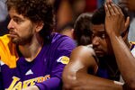 DENVER, CO - MAY 10:  Pau Gasol #16 of the Los Angeles Lakers (L) and Andrew Bynum #17 react from the bench against the Denver Nuggets in Game Six of the Western Conference Quarterfinals in the 2012 NBA Playoffs at Pepsi Center on May 10, 2012 in Denver, Colorado. The Nuggets defeated the Lakers 113-96. NOTE TO USER: User expressly acknowledges and agrees that, by downloading and or using this photograph, User is consenting to the terms and conditions of the Getty Images License Agreement.  (Photo by Justin Edmonds/Getty Images)
